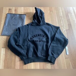 NEW Fear of God Essentials Jet Black Hoodie, size Medium